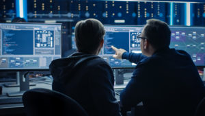 IT professionals working on cyber infrastructure