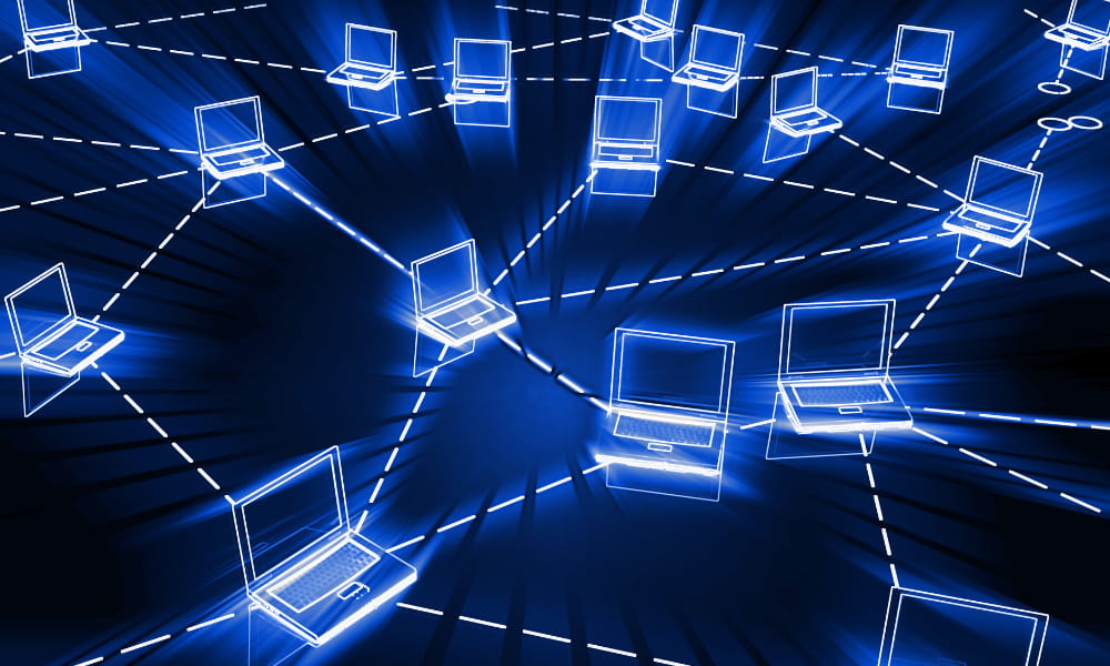 computers being connected symbolizing the importance of cybersecurity